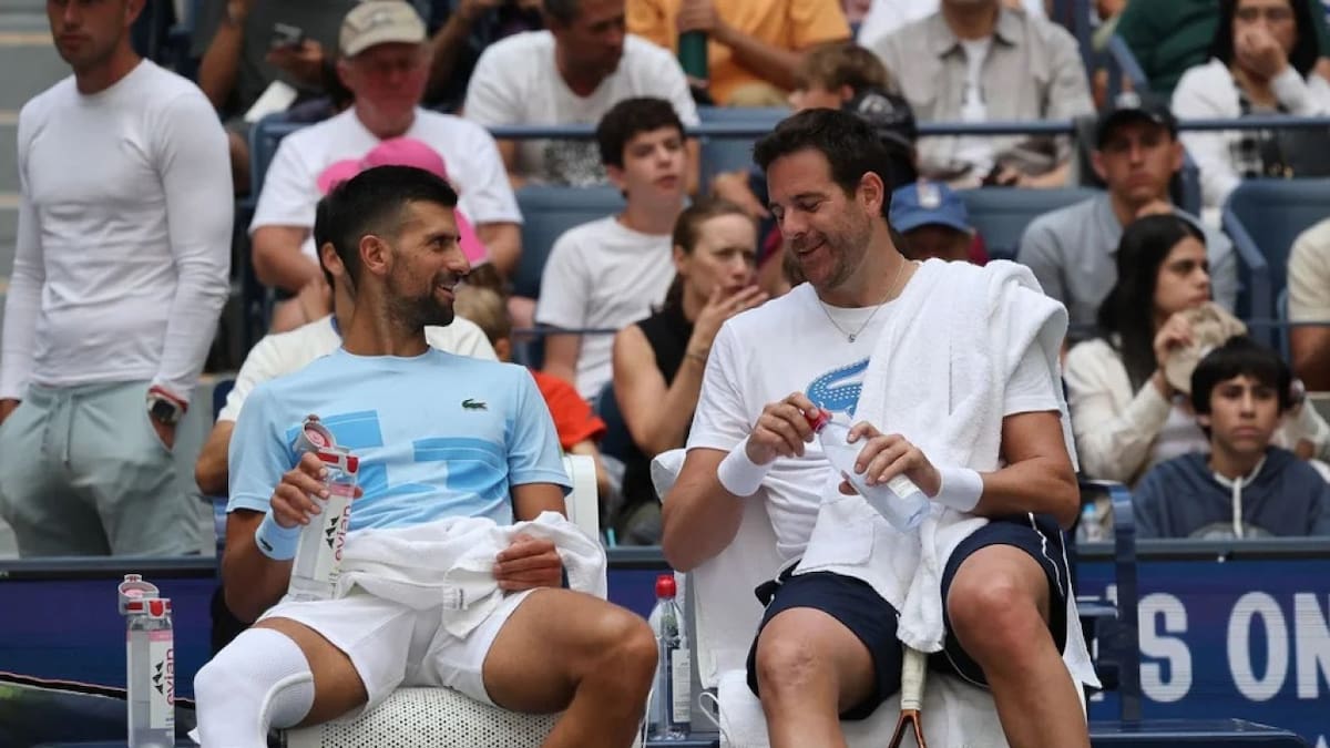 Novak Djokovic y Juan Martín Del Potro en el US Open. Foto. NA.