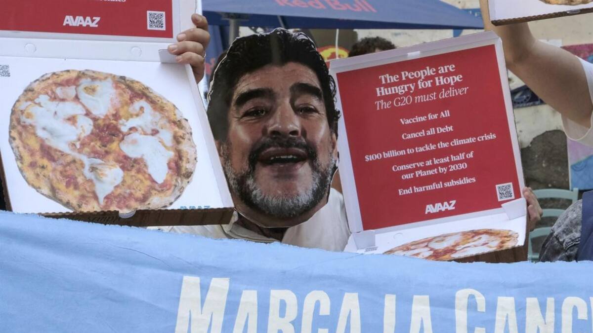 Protestas con máscaras de Maradona en el G20 en Nápoles, EFE