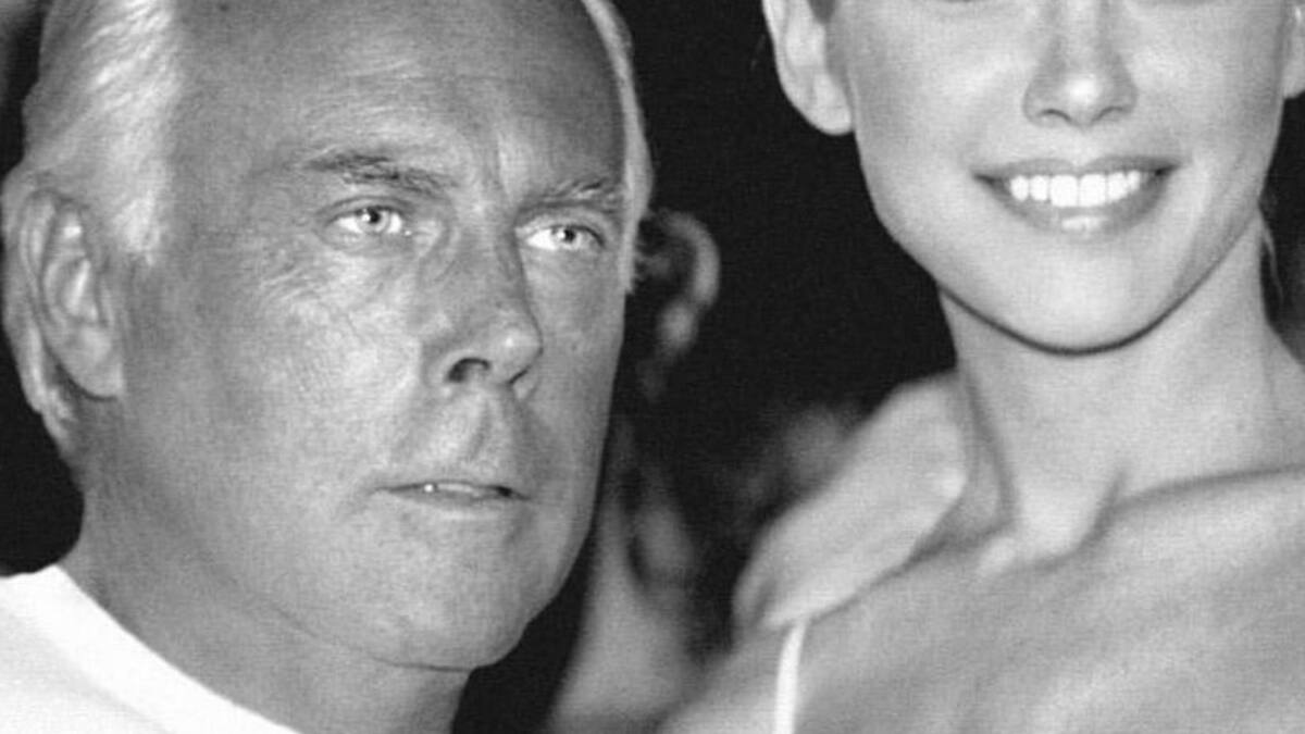 Valeria Mazza junto a Giorgio Armani.