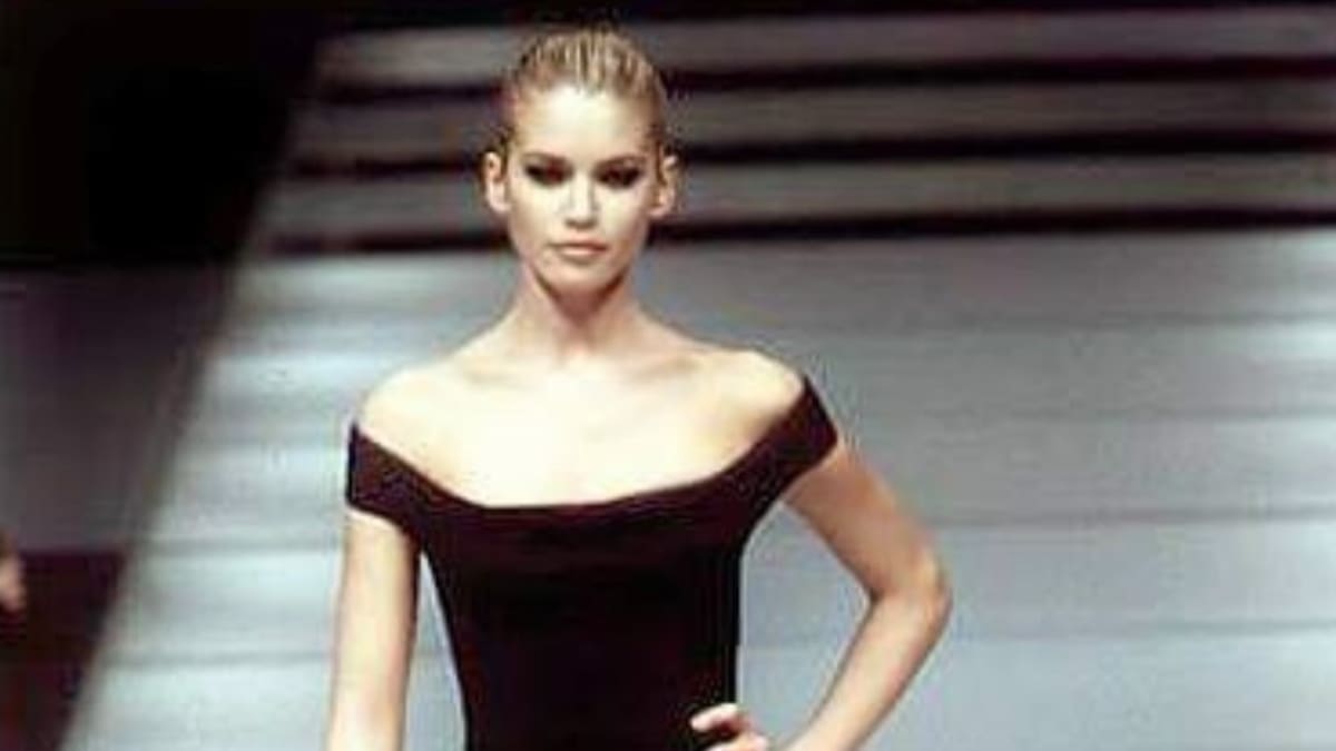 Valeria Mazza junto a Giorgio Armani.