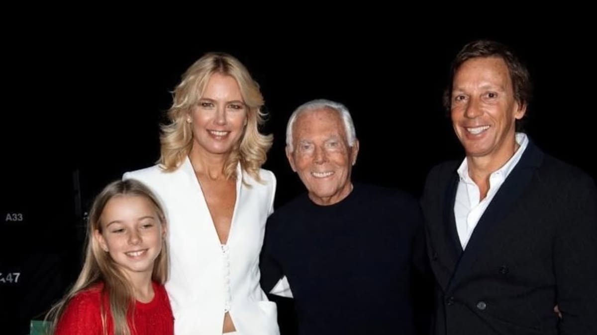Valeria Mazza junto a Giorgio Armani.